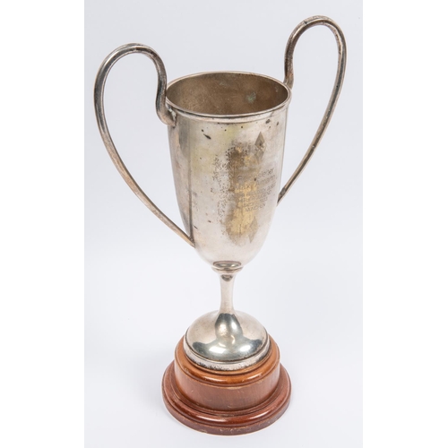 65 - A Third Reich silver plated prize cup, engraved with Hitler Youth badges and on one side 