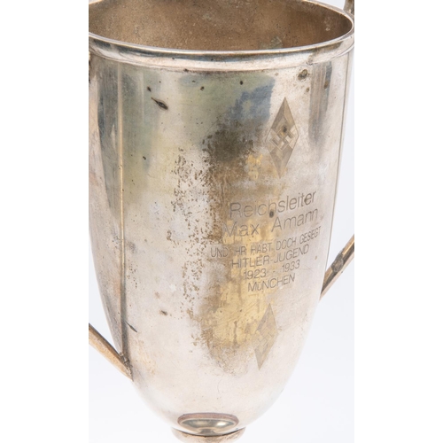 65 - A Third Reich silver plated prize cup, engraved with Hitler Youth badges and on one side 