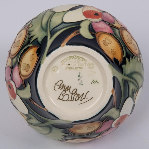 10 - A small Moorcroft pottery vase from 2019. With butterflies and honesty design on purple ground by Em... 