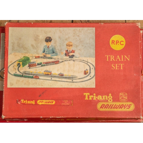 215 - 2x scarce Tri-ang Train Sets and another set. An RPC comprising a steeple cab 0-4-0 diesel locomotiv... 