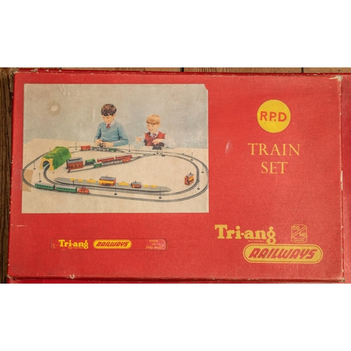 215 - 2x scarce Tri-ang Train Sets and another set. An RPC comprising a steeple cab 0-4-0 diesel locomotiv... 