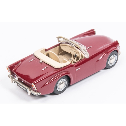 318 - A Pathfinder Model white-metal 1:43 scale 1962 Daimer SP250 Soft-Top (PFM9). In maroon with beige in... 