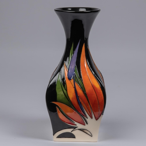 37 - A Moorcroft pottery vase with square body. With Art Deco style leaf forms. Marks to base, JS, AY, an... 