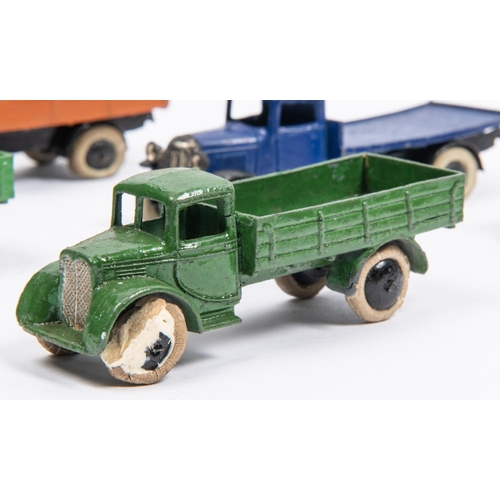 393 - 5x Dinky Toys commerical vehicles, all with first type smooth black wheels, and 4x examples with whi... 