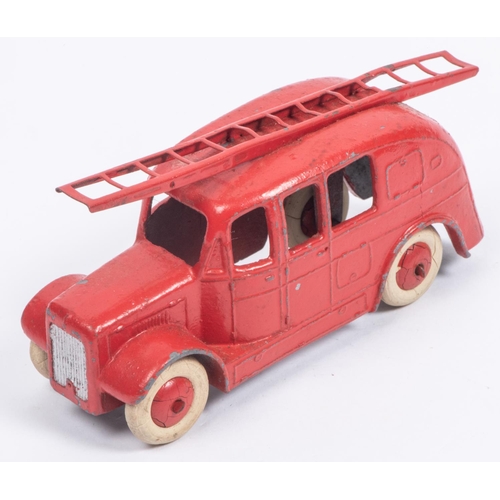 395 - A Dinky Toys 25h Streamlined Fire Engine. An early (first) example without baseplate in red with smo... 