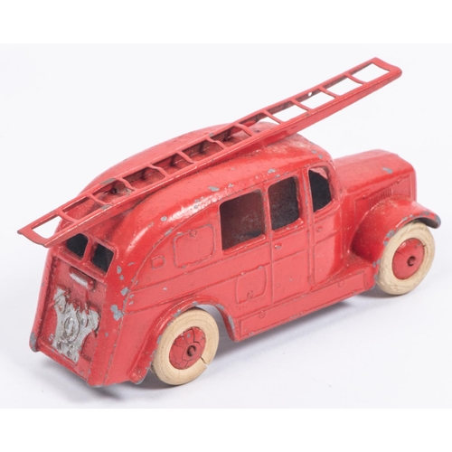 395 - A Dinky Toys 25h Streamlined Fire Engine. An early (first) example without baseplate in red with smo... 