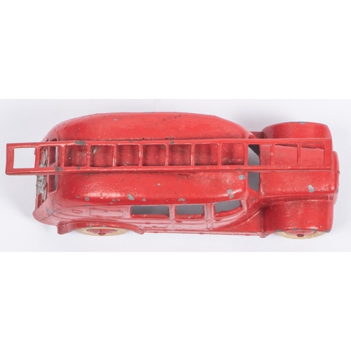 395 - A Dinky Toys 25h Streamlined Fire Engine. An early (first) example without baseplate in red with smo... 