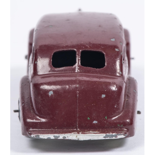 399 - A Dinky Toys 39d Buick Viceroy Saloon in maroon with early metallic laquered baseplate, smooth black... 