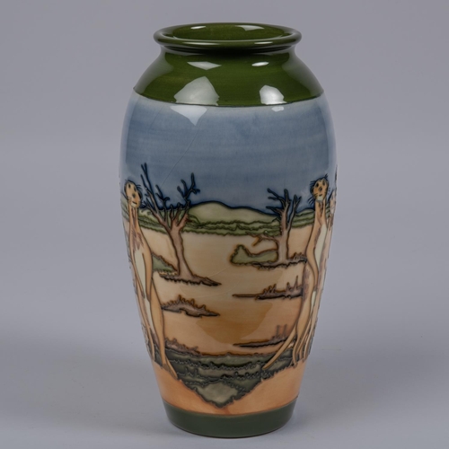 43 - A Moorcroft pottery vase. Meerkats in arid scene. Impressed marks to base, JW, key date cypher for 2... 