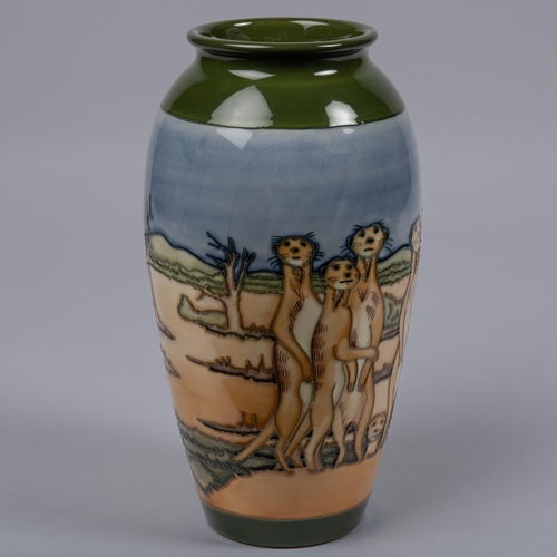 43 - A Moorcroft pottery vase. Meerkats in arid scene. Impressed marks to base, JW, key date cypher for 2... 