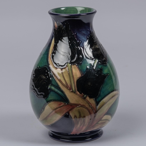 44 - Moorcroft pottery vase from 1991. 'Black Tulip' design by Sally Tuffin. Impressed marks etc to base ... 