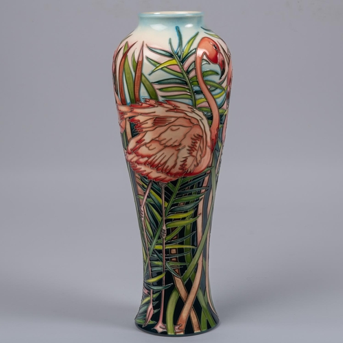 49 - A Moorcroft pottery tall vase. With flamingos in undergrowth. Impressed marks to base, DS, LB, teapo... 