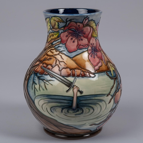 51 - A Moorcroft pottery vase. Arthurian scene showing Sir Bedivere throwing the sword Excalibur into the... 