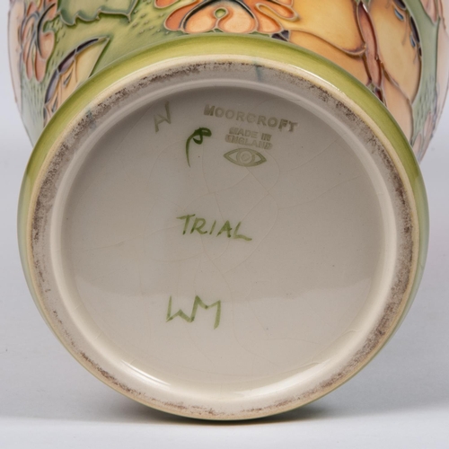 6 - A Moorcroft pottery vase from 1994. A trial piece with butterfly designs. Marks etc to base with eye... 