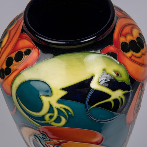 65 - A Moorcroft pottery vase. Hornbills with lizards and pomegranates by Kerry Goodwin. Marks to base, K... 