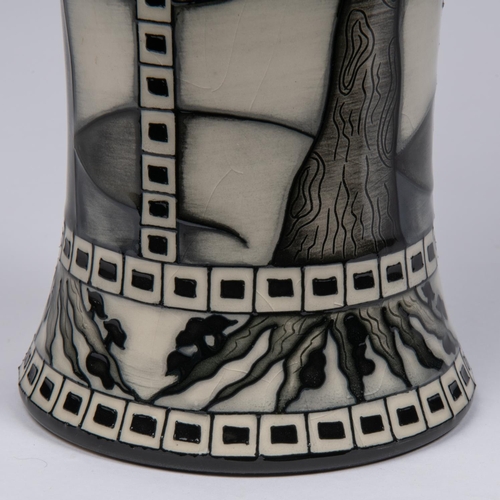 68 - A Moorcroft pottery tall vase. Leafless trees with mushrooms around the bases in black and white by ... 