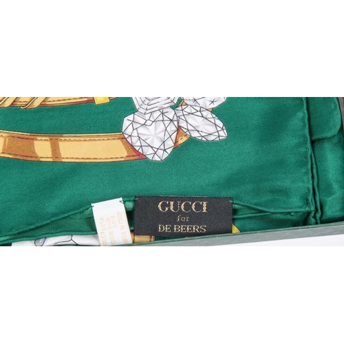 75 - A Gucci Head Scarf made for De Beers (1989). Head scarf of printed silk commemorating the winners of... 