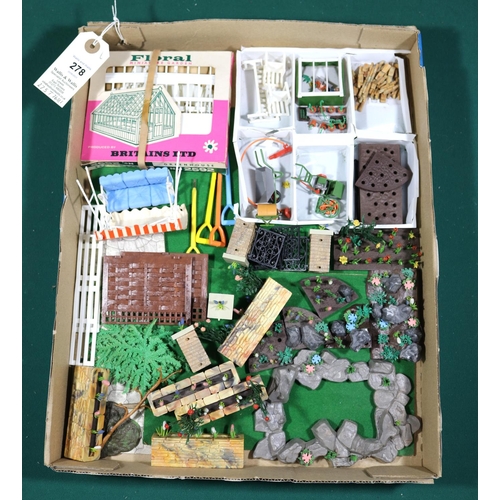 278 - A quantity of 1960's plastic Britains Garden. Including a boxed green house (2592), plus unboxed ite... 