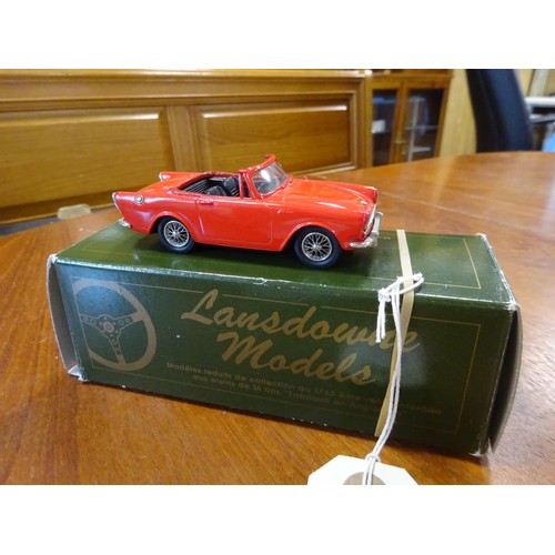 320 - A Lansdowne Models white-metal 1:43 scale 1963 Sunbeam Alpine Series III Soft-Top (LDM 11). In red w... 