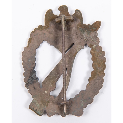 126 - A Third Reich Infantry Assault badge, well detailed, with traces of bronze finish, slightly concave ... 