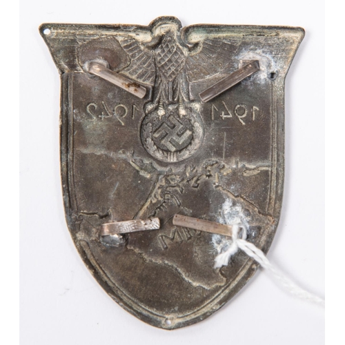 128 - A Third Reich 1941-1942 Krim shield, with 4 bend over blades, 3 small holes for sewing directly onto... 