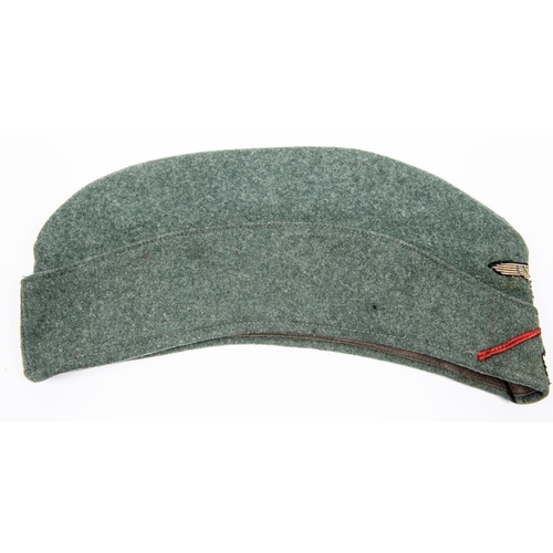 158 - A Third Reich mans' FS cap, of the SS Artillerie Schuzen, dated 1939. GC £400-450