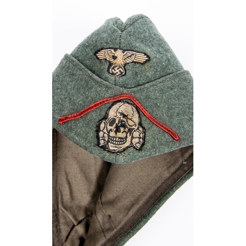 158 - A Third Reich mans' FS cap, of the SS Artillerie Schuzen, dated 1939. GC £400-450