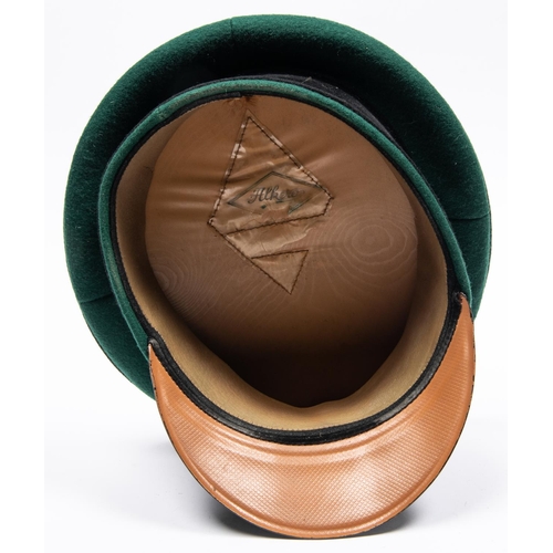 162 - A Third Reich Olympic official's SD cap, green cloth with plated mounts. GC £300-350