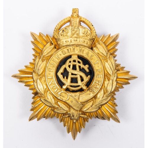 221 - A good post 1902 gilt pouch badge of the Army Service Corps, with black enamel centre,. VGC, the gil... 