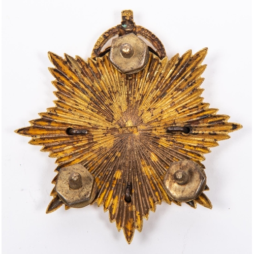 221 - A good post 1902 gilt pouch badge of the Army Service Corps, with black enamel centre,. VGC, the gil... 