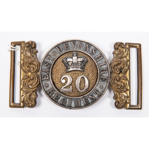 225 - An officer's pre 1881 waist belt clasp of the 20th East Devonshire Regiment, GC(gilt worn). £80-120