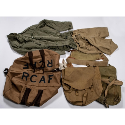 231 - A webbing waistbelt and gaiters, 2 packs, a pair of khaki shorts and a combat jacket. GC £30-40