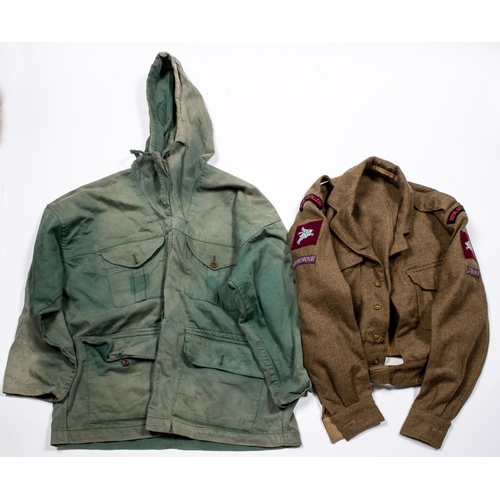 234 - A WWII windproof smock, green colour (faded in patches); a 1949 pattern BD jacket with Airborne insi... 