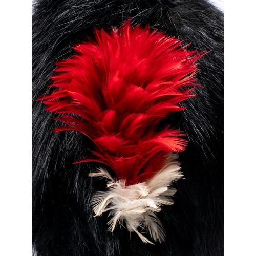 239 - A fine Victorian officer's black bearskin cap of the Northumberland Fusiliers Volunteer battalion, s... 