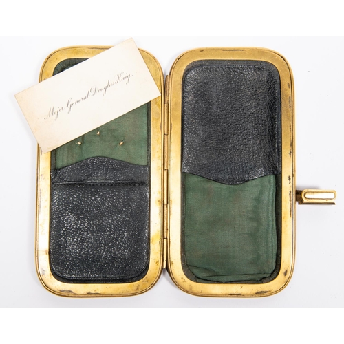 50 - A gilt brass mounted leather card case, the front mounted with Victorian crown over 