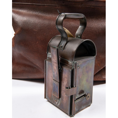 52 - A doctor's large leather bag, with brass lock and catches, the body bearing the initials 