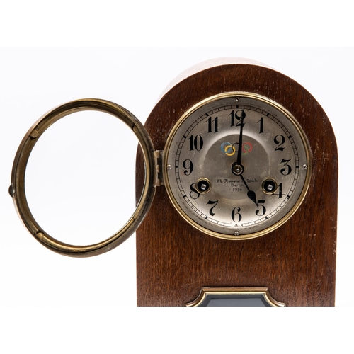 61 - A Third Reich oak mantle clock, the face marked 