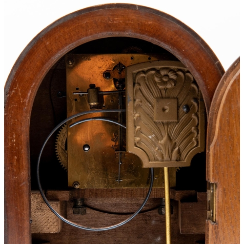 61 - A Third Reich oak mantle clock, the face marked 