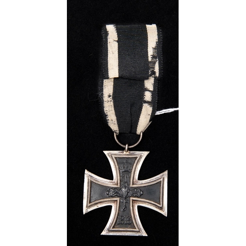 74 - A German 1914 Iron Cross 2nd Class, with ribbon. GC a good example. £40-60