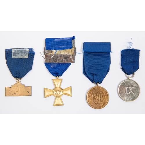 84 - Three Prussian Long Service medals: officer's gilt 15 year cross with F W III bar; 12 years medal; a... 