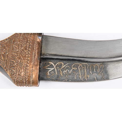 329 - A very good Arab jambiya, watered steel blade 6½”, with panel of overlaid silver Arabic script on on... 