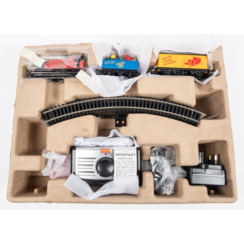 21 - 2 Hornby Hobbies Train Sets. An i Traveller 6000. HM6000 App Based Analogue Control train set. Compr... 