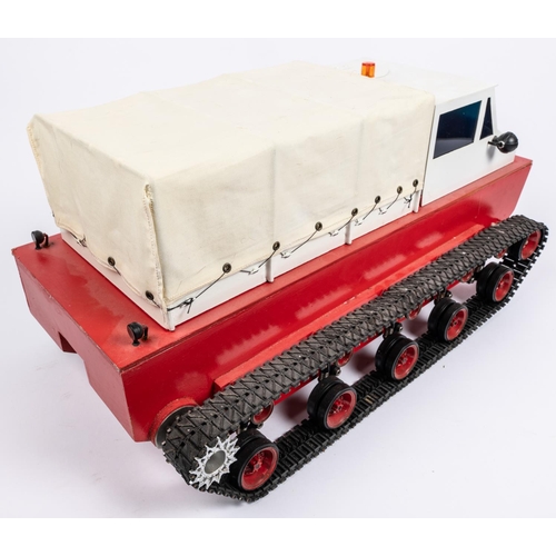 269 - An unusual model of an Artic/Antarctic style amphibian tracked cargo vehicle, fitted with working li... 