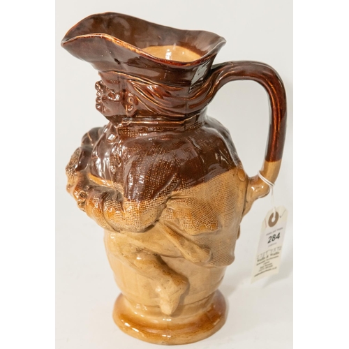 284 - A Doulton Lambeth Toby XX jug (6365). Figure holding jug of ale, sitting on barrel. Issued 1863 onwa... 