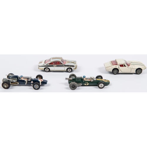 336 - 4 Corgi Toys. Lotus-Climax Formula 1 Racing Car (155). In green with yellow stripe, RN 1. Cooper Mas... 