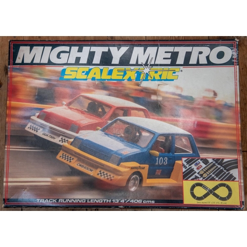 382 - A large quantity of Scalextric with boxed sets and accessories. Including 3x sets; a Formula 1 GP8 s... 