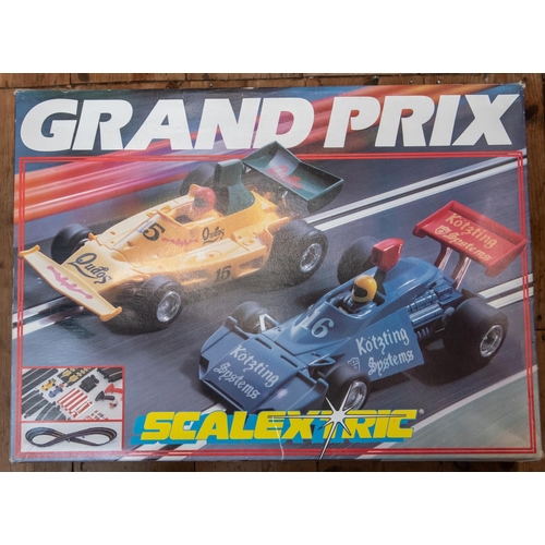 382 - A large quantity of Scalextric with boxed sets and accessories. Including 3x sets; a Formula 1 GP8 s... 