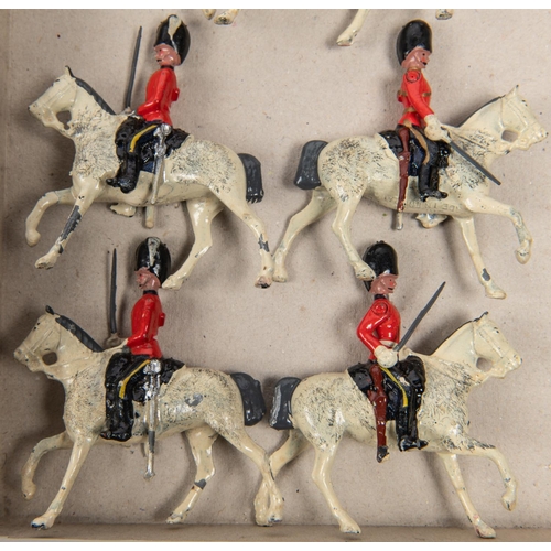 460 - Britains Hollow cast lead figures, 4 Mounted Life Gaurds, 1 is rearing up, 6 Dragoon Guards all moun... 