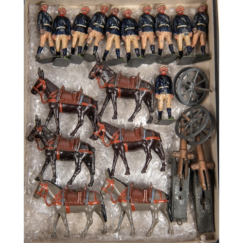 461 - Britains Royal Mountain Artillery. Comprising 6 mules, 2 gun barrels, 2 frames and 2 sets of wheels,... 