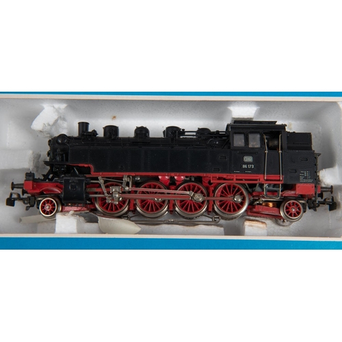 84 - 2x Marklin HO gauge 3-rail locomotives. A streamlined 4-6-2 tender loco (3094), 03 1051, in lined bl... 